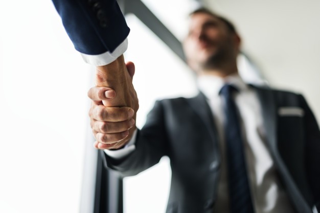 Business men shaking hands